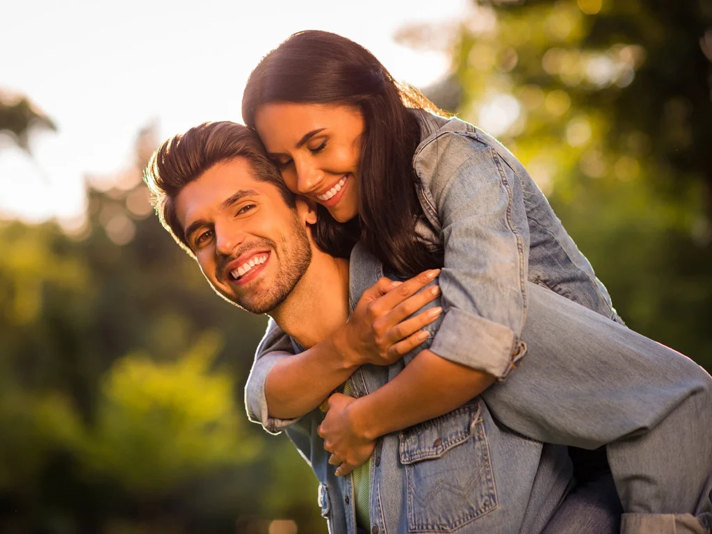 Young couple smiling together with white teeth | Teeth cleanings in Chester Springs, PA
